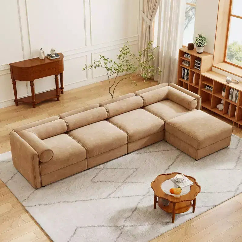 Canapé modulable avec rangement, dossier cylindrique et accoudoirs, assise profonde et confortable, durable et offrant un bon soutien pour le salon.